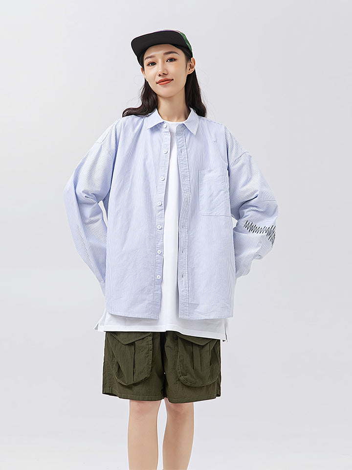 モデル画像: モデルが着用したコットン 100%刺繍トレンド長袖シャツ