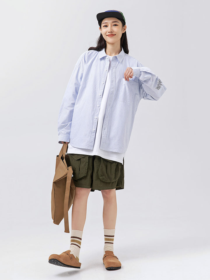 モデル画像: モデルが着用したコットン 100%刺繍トレンド長袖シャツ