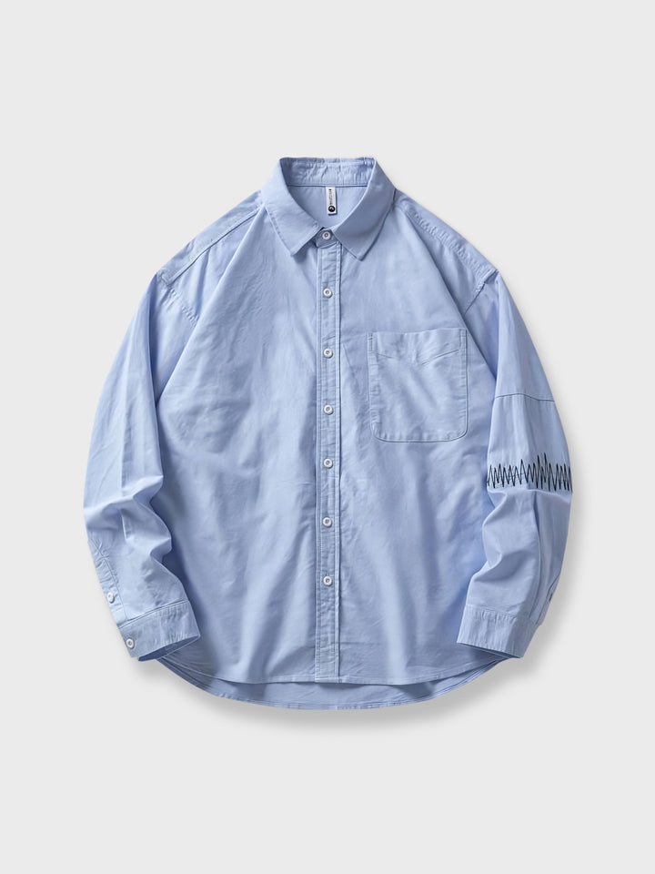製品画像: コットン 100%刺繍トレンド長袖シャツの正面図