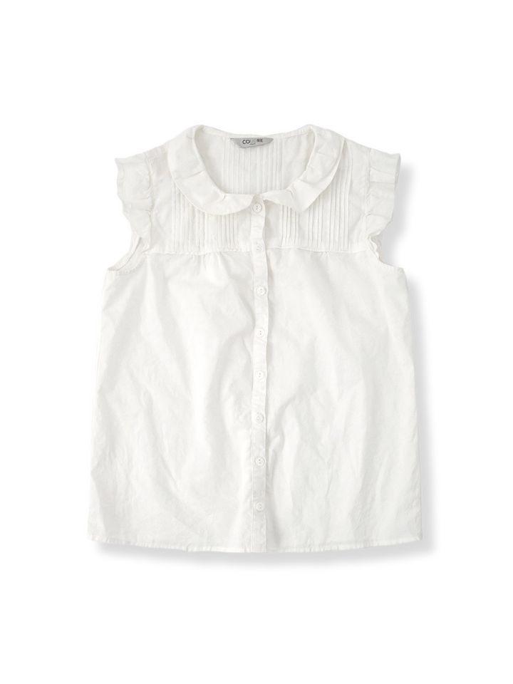 フランス少女向けのプリーツ付きフリルスリーブレス白コットンシャツ全体像。