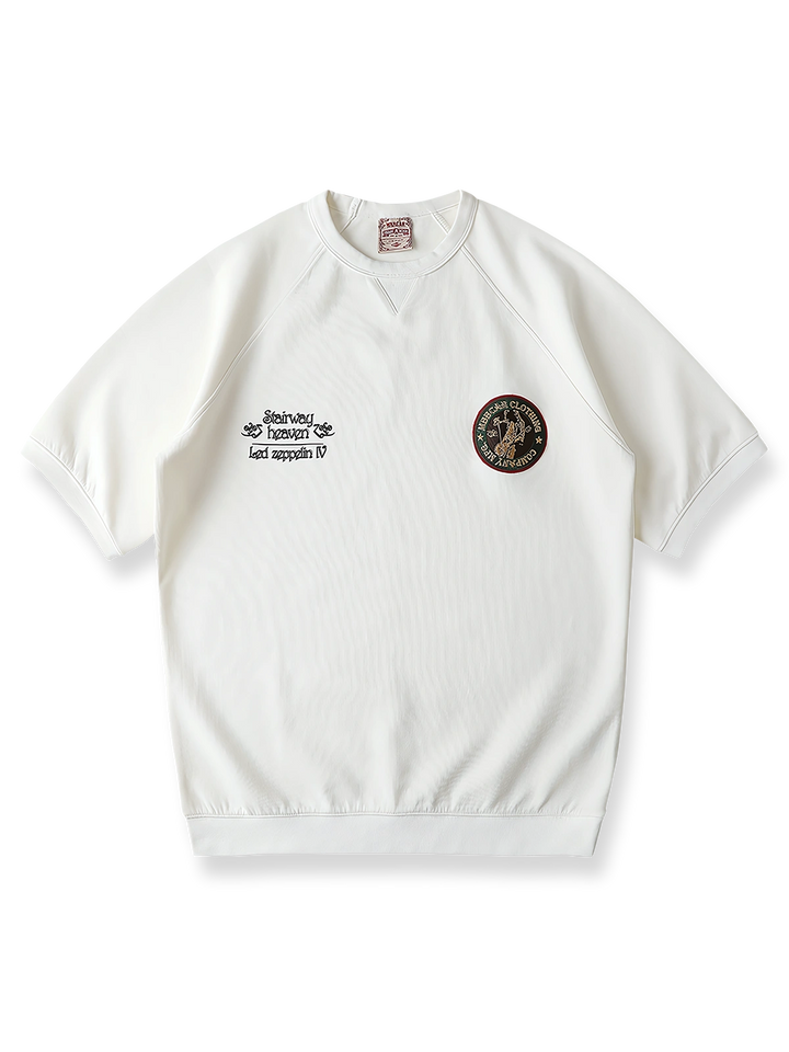 ツェッペリン飛行船とジミー・ペイジのロゴが刺繍されたロックTシャツ。