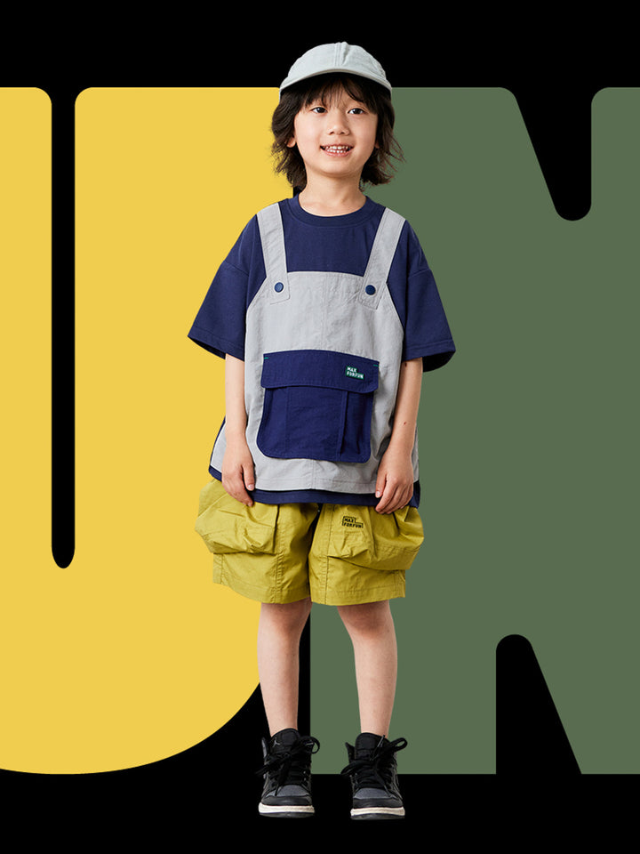 モデルの子供がフェイクサスペンダークール半袖Tシャツを着用しているアウトドア活動のシーン