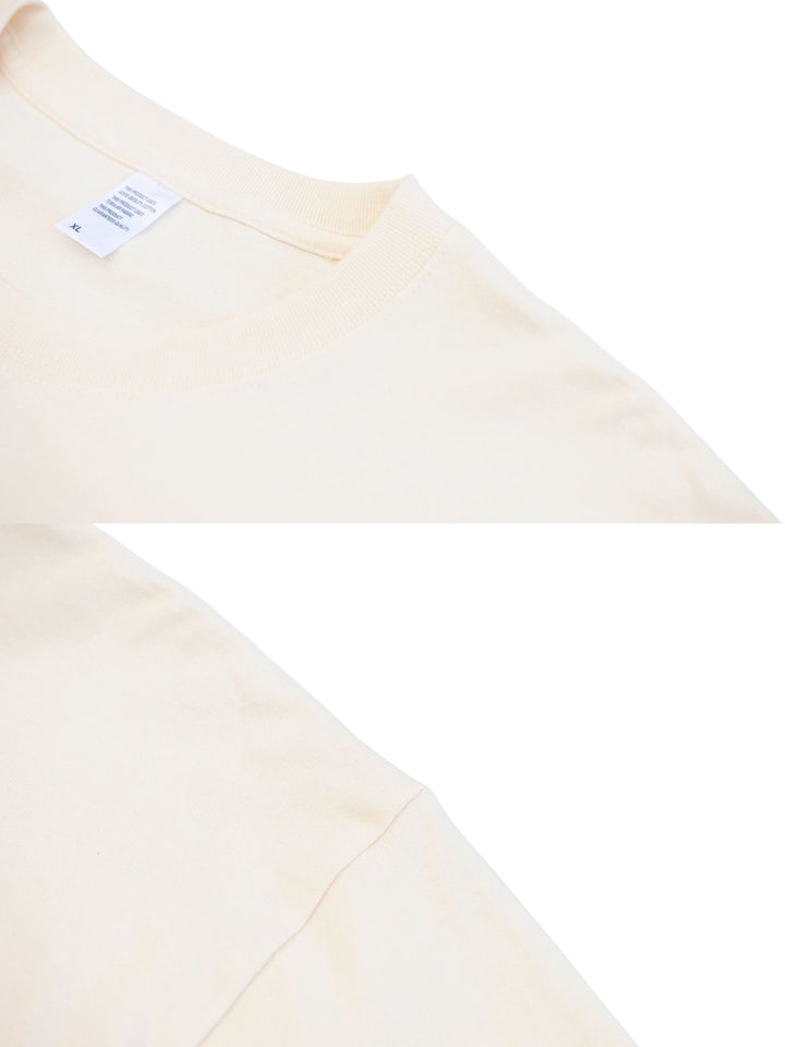 カートゥーンプリントのクローズアップ、鮮やかなディテールが特徴の半袖Tシャツ。