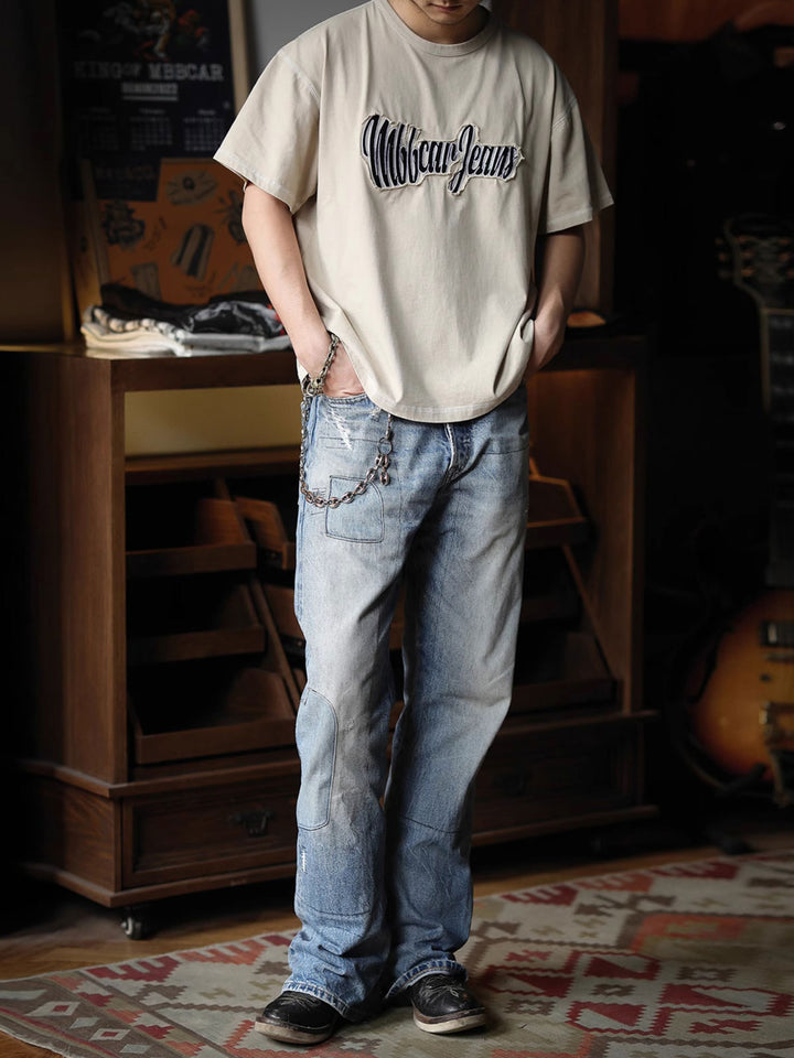 モデル画像: モデルが着用している260gヴィンテージウォッシュショートワイドTシャツの画像