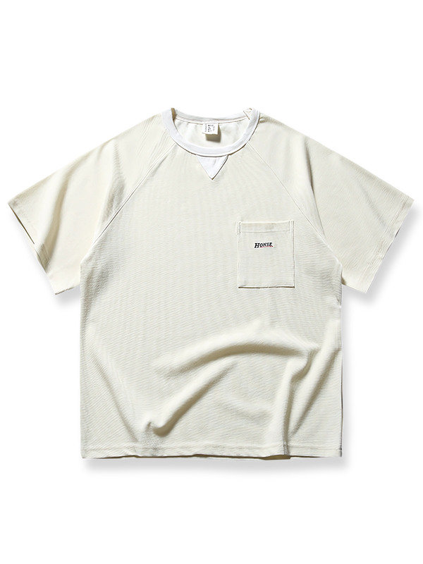 製品画像: ワッフル地ヴィンテージ風ポケット付き半袖Tシャツの正面図