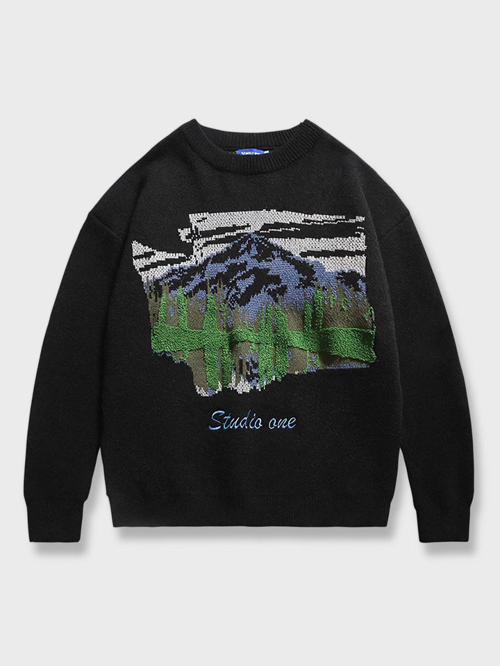 雪山の風景が描かれた柔らかいニット素材のセーター。
