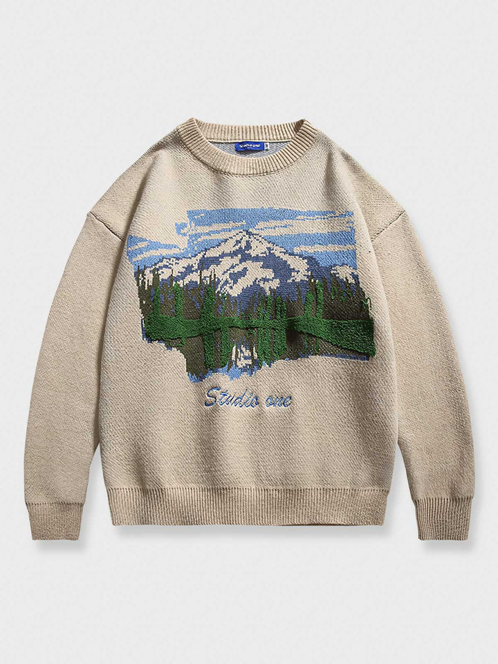 雪山の風景が描かれた柔らかいニット素材のセーター。