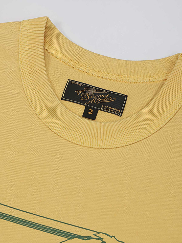 1980 Running Race バティックアメリカンプリントオーバーサイズ半袖Tシャツの細部展示、プリントと生地のテクスチャを含む