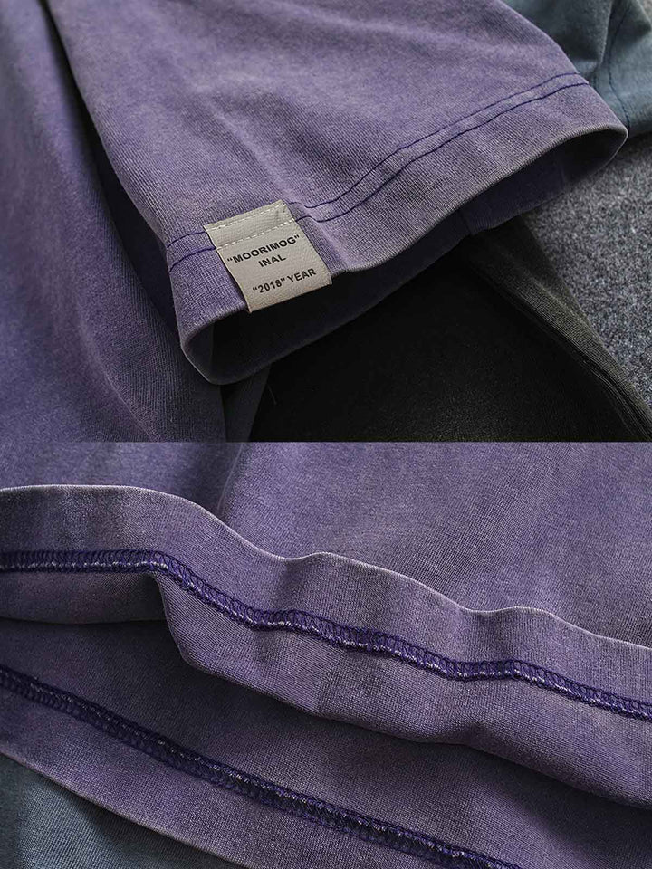 ドロップショルダーヘビーウェイトTシャツの細部と高品質ダブルヤーンピュアコットン素材のクローズアップ。通気性と吸湿性に優れ、独特の加工技術による色落ちのしにくいテクスチャを特徴としています