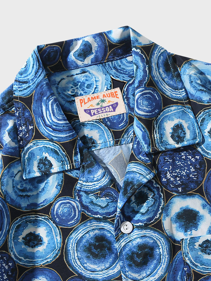 PLAME AUBEアロハシャツの細部、前面ポケットと独特な円模様のクローズアップ