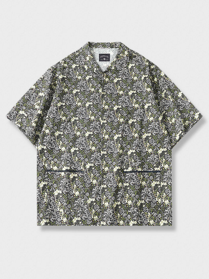 PLAME AUBEの花柄とツタデザインが特徴の半袖シャツ、独特な襟とカットアウト織り帯ポケットデザイン、コットン100%、白背景